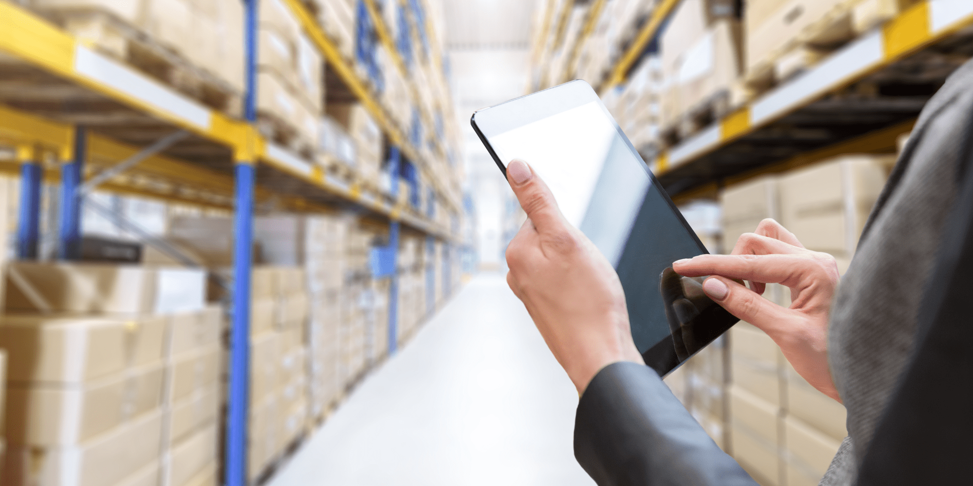 Australian small business owner reviewing cashflow and invoices